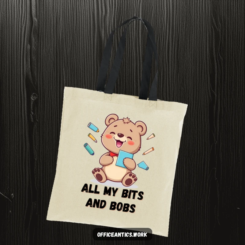 Funny tote bag with a cheerful bear cub juggling office supplies, adding a silly grin and joy to your day.